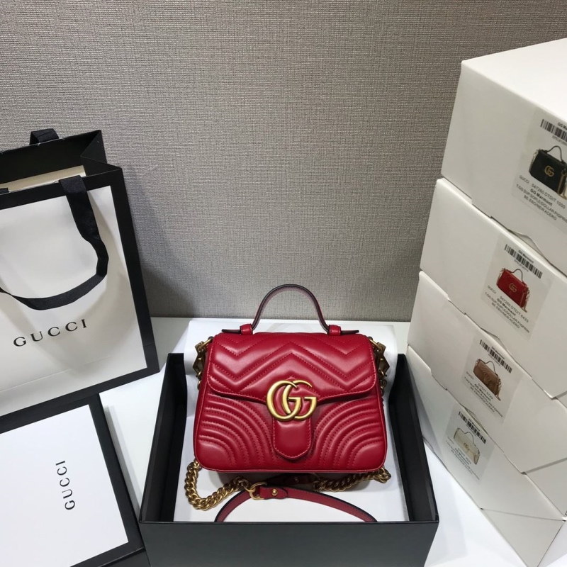 G*u*i top handle bags